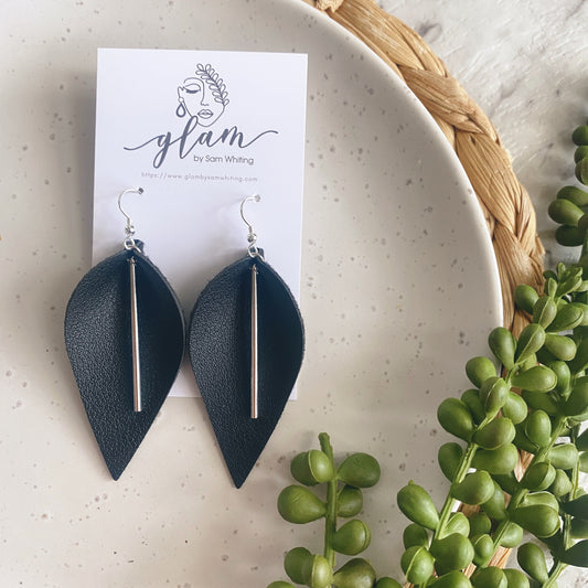 black petal shaped leather earrings with silver bar