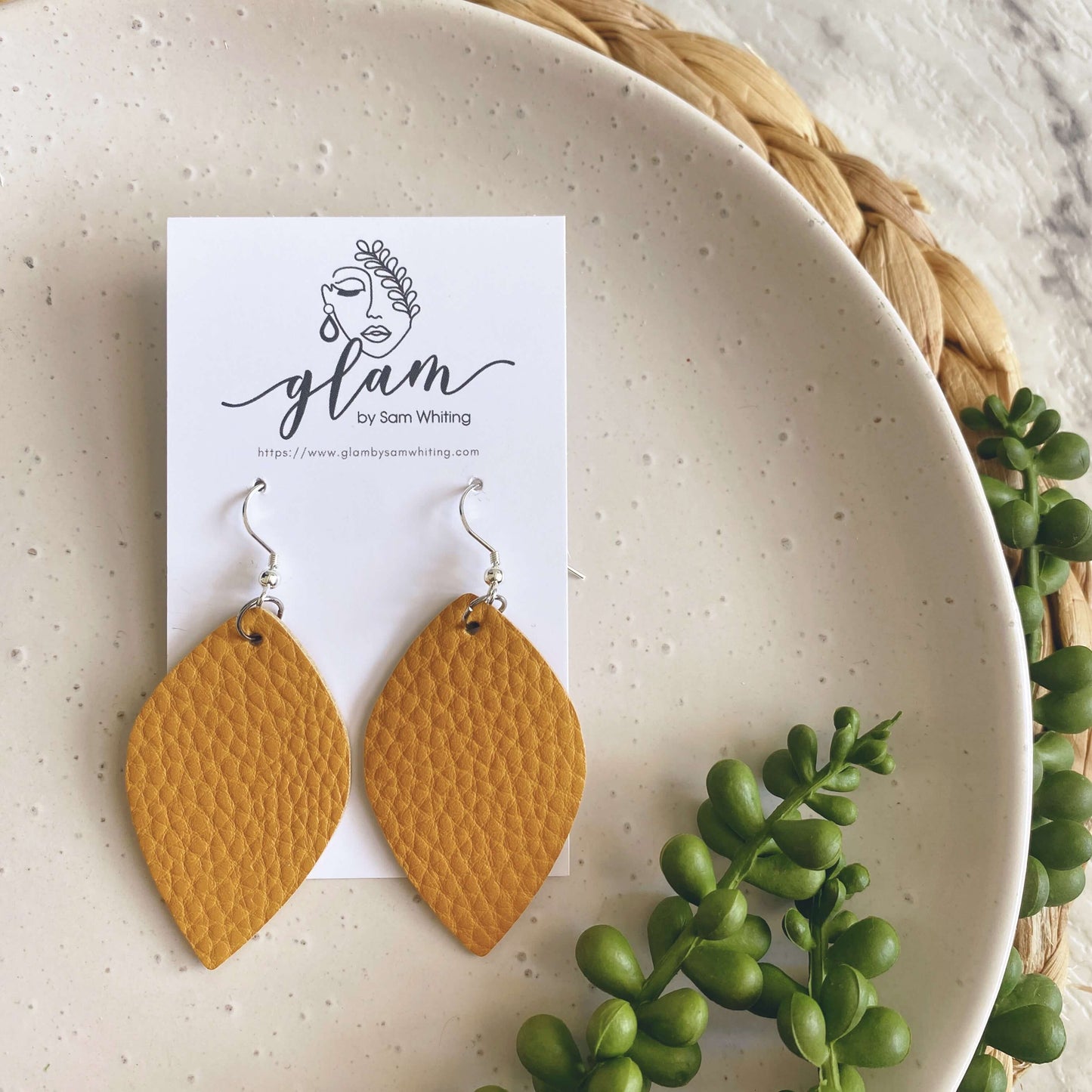 mustard leaf shape midi sized leather earrings